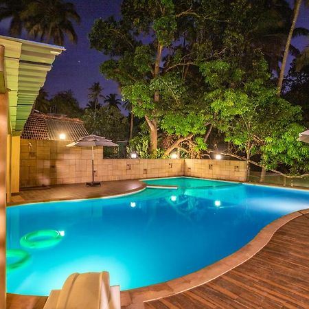 Coco Goa Hotel Arpora Bagian luar foto