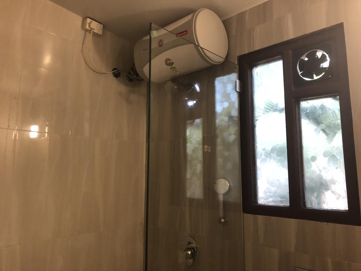 Coco Goa Hotel Arpora Bagian luar foto