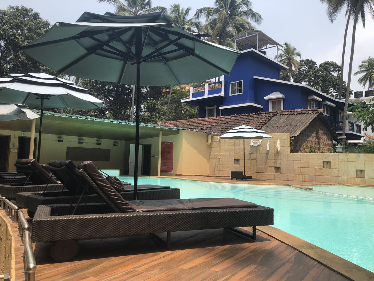 Coco Goa Hotel Arpora Bagian luar foto