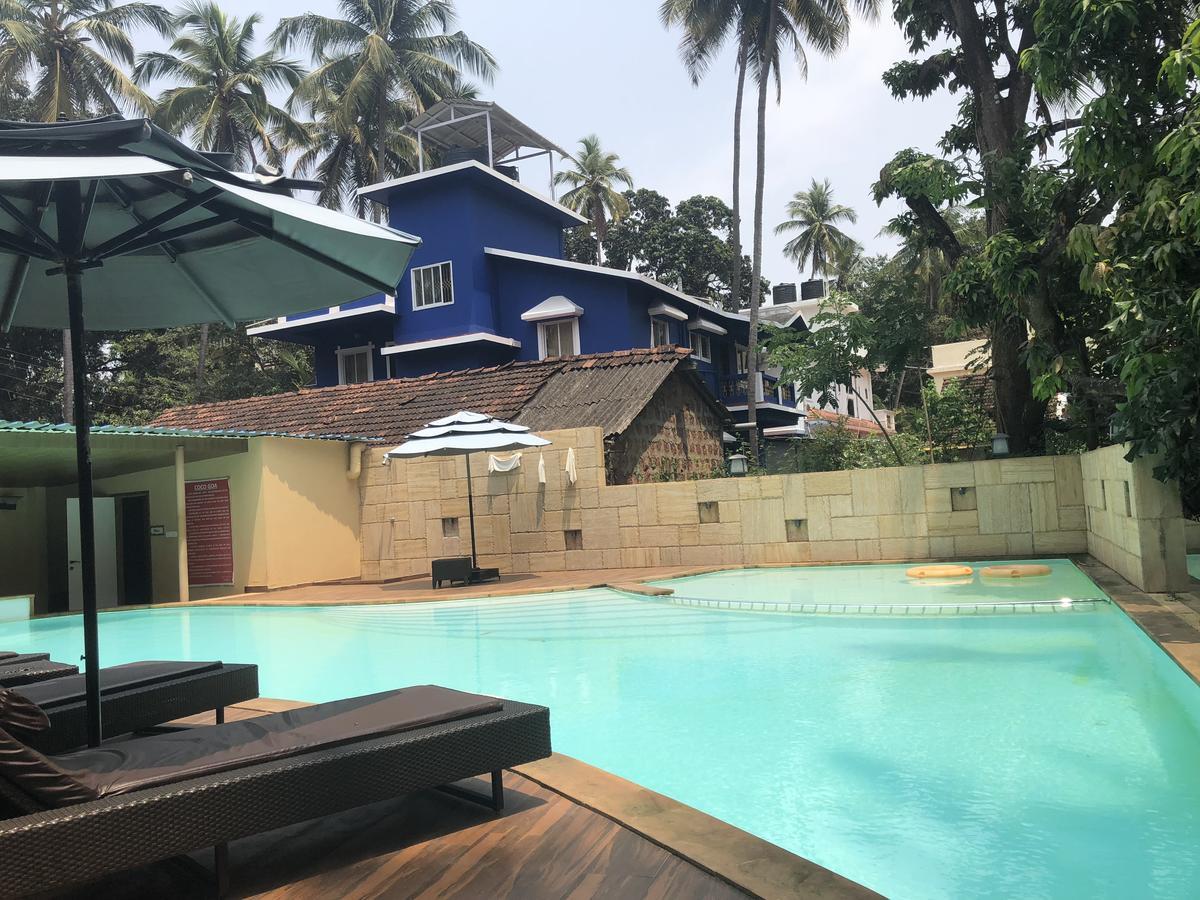 Coco Goa Hotel Arpora Bagian luar foto